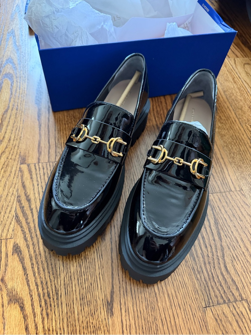 Stuart Weitzman Black Patent Leather Loafers with Gold Chain Detail
